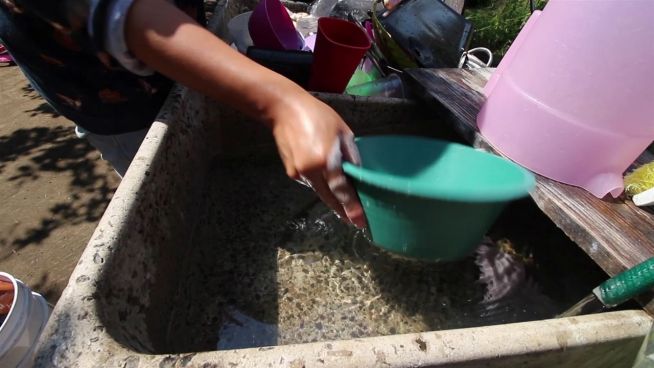 Armenviertel: Wasserversorung in Mexiko durch Regen